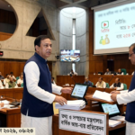 "Inside view of the Bangladesh National Parliament session where the Information Minister is presenting the annual financial report of state-owned media organizations."