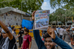 শহীদ মিনার থেকে মিছিলের দৃশ্য ও শিক্ষাখাত দাবির পোস্টার