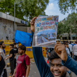 শহীদ মিনার থেকে মিছিলের দৃশ্য ও শিক্ষাখাত দাবির পোস্টার