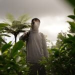 চা-বাগান শ্রমিকদের মাঝে রেইনকোট বিতরণ